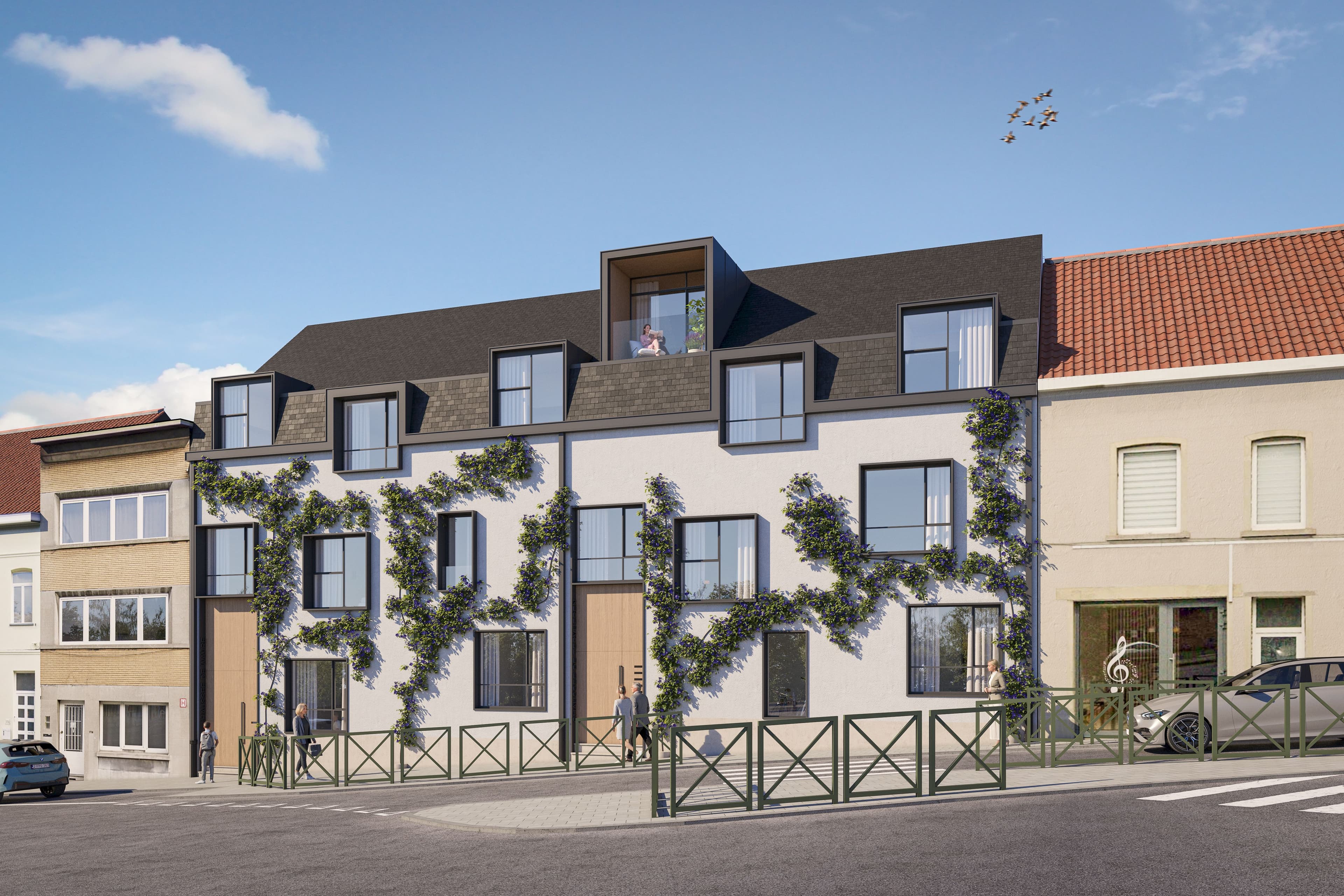 Immeuble résidentiel neuf à façade végétalisée avec plantes grimpantes, lucarnes modernes et appartement en attique, dans une rue commerçante en Belgique.